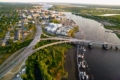Aerial view of Wilmington, North Carolina with river, bridges, downtown buildings, and marina